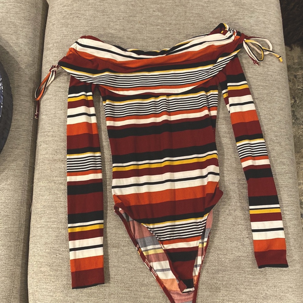 Different color body suit